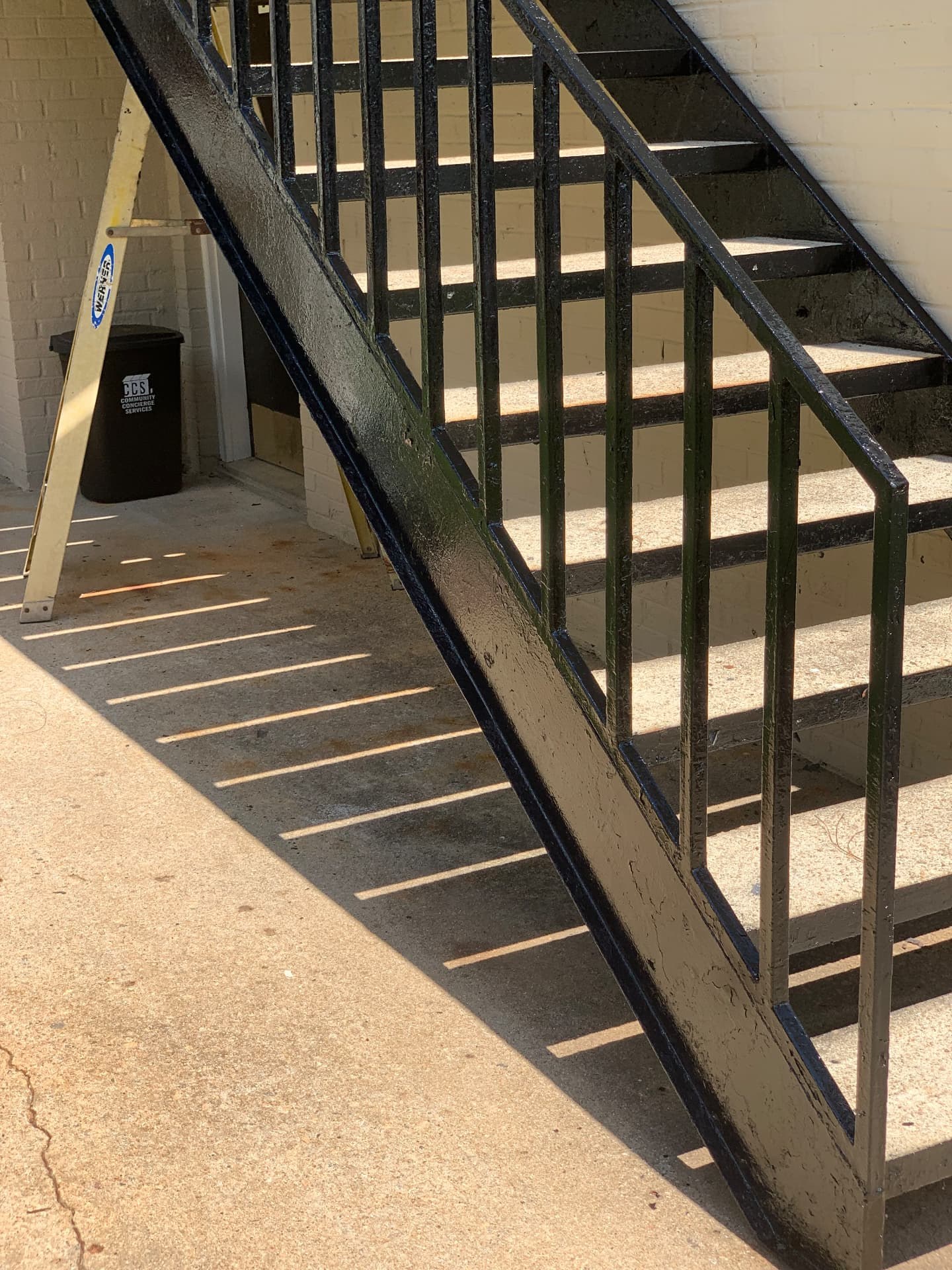 Detail of finished steel stair railing and steps